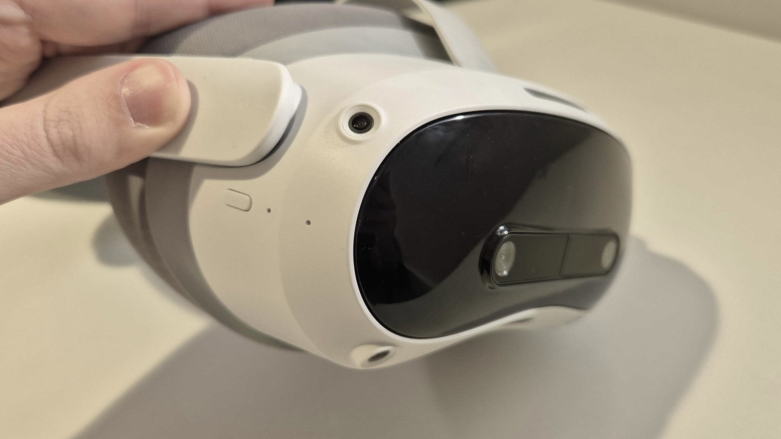 Pico 4 Ultra's front cameras are prominent as it rests on a table