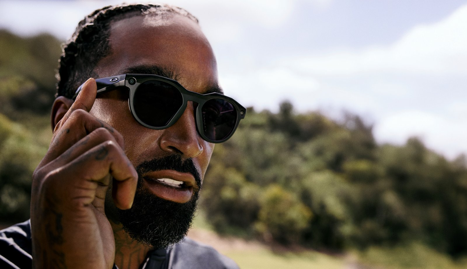 The Oakley Meta HSTN smart glasses being used by an athlete on a hike